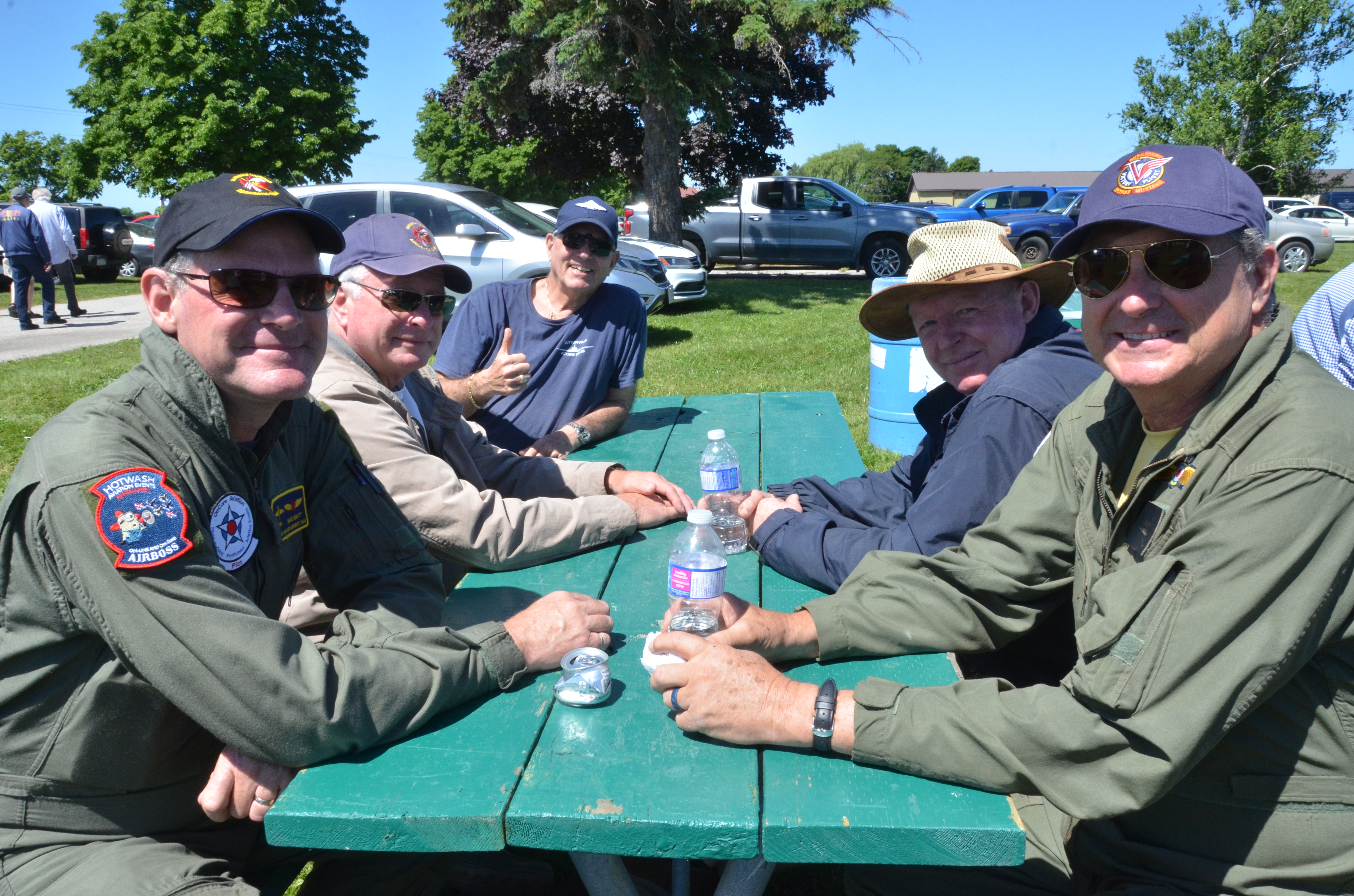 Woodstock Harvards pilots Dave Hewitt, Joe Cosmano, Pete Spence and Brian Pinder taking a break after a BBQ lunch. COPA Member Marvin Kalchman giving a big Thumbs Up to the Lancaster Fly In.