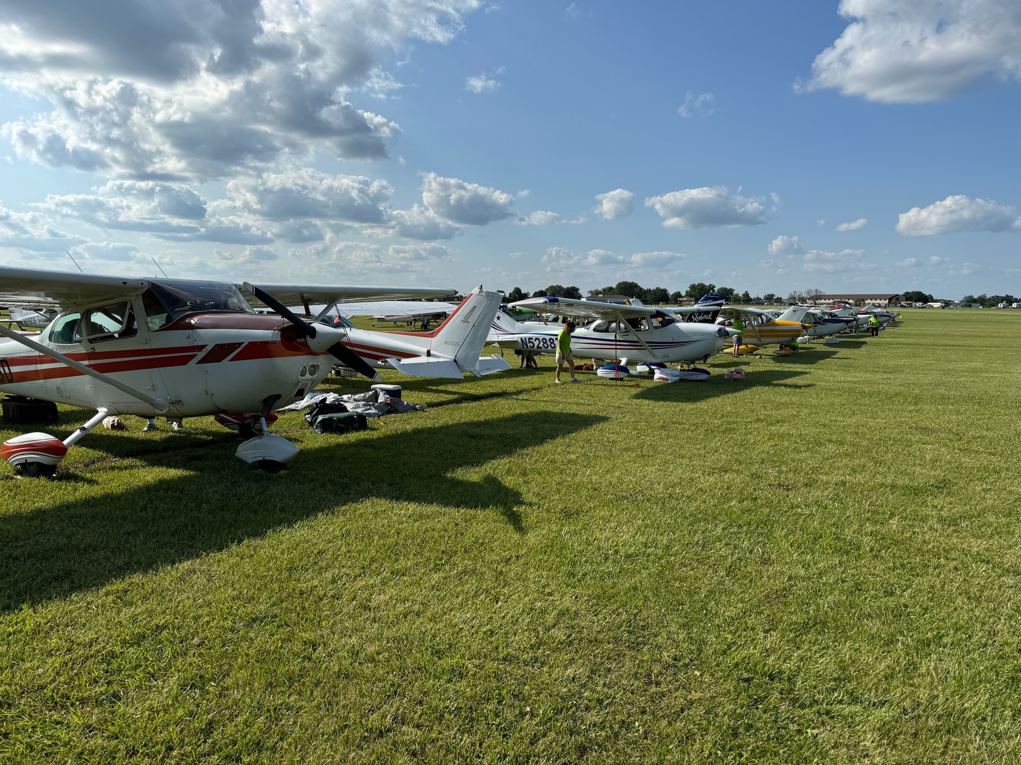 The first row of the Cessna 2 Oshkosh parked at the North 40 at AirVenture. Image courtesy of Nick Shaffer.