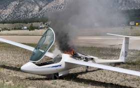A glider on fire at Invermere Airport
