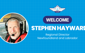 Photo of man in airplane smiling. Text on blue background saying "Welcome Stephen Hayward - Regional Director, Newfoundland and Labrador"